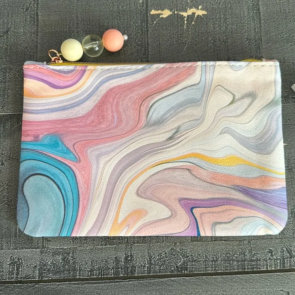 Ipsy March 2024 Swirl Soft Tones with Charm Zip Pull